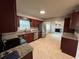 Updated kitchen featuring stainless steel appliances, granite countertops, and modern cabinetry at 422 Crosswinds Dr, Palm Harbor, FL 34683
