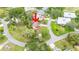 The property is nestled in a quiet neighborhood with mature trees at 4744 Burlington Rd, Land O Lakes, FL 34639