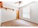 Bedroom with neutral walls, ceiling fan and carpeted flooring at 4744 Burlington Rd, Land O Lakes, FL 34639