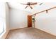 Bedroom with neutral walls, ceiling fan and carpeted flooring at 4744 Burlington Rd, Land O Lakes, FL 34639
