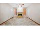 Inviting living room with a stone fireplace and large windows, filled with natural light at 4744 Burlington Rd, Land O Lakes, FL 34639