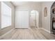 Bright bedroom features light walls, a large closet and wood-look floors at 5334 Tummel Ct, Wesley Chapel, FL 33545