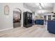 Spacious open kitchen with island seating, stainless appliances, and open to living space at 5334 Tummel Ct, Wesley Chapel, FL 33545