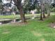 Backyard featuring a pond at 5530 Salem Square N Dr, Palm Harbor, FL 34685