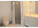 Bathroom featuring a shower, toilet, vanity with sink, and tile flooring at 5530 Salem Square N Dr, Palm Harbor, FL 34685