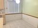 Eat in kitchen area with large window and classic finishes at 5530 Salem Square N Dr, Palm Harbor, FL 34685
