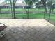 Paver patio with a view of a pond at 5530 Salem Square N Dr, Palm Harbor, FL 34685