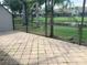Paver patio with a view of a pond at 5530 Salem Square N Dr, Palm Harbor, FL 34685