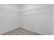 Empty walk-in closet features ample wire shelving, ready to accommodate storage needs within the home at 5830 Babian Rd, North Port, FL 34291