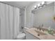Clean bathroom featuring a shower-tub combination, vanity, and modern fixtures at 6497 43Rd N Ave, Kenneth City, FL 33709