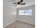 Clean and spacious bedroom featuring a ceiling fan and a window at 6497 43Rd N Ave, Kenneth City, FL 33709