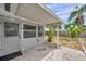 A view of the covered patio with easy access to backyard at 6497 43Rd N Ave, Kenneth City, FL 33709