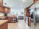 Modern kitchen with stainless steel appliances and seamless flow into the living area at 6706 S Trask St, Tampa, FL 33616