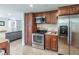 Well-equipped kitchen with stainless steel appliances and ample wood cabinet space at 6706 S Trask St, Tampa, FL 33616