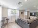 Comfortable living room with modern lighting and a stylish entertainment center at 6706 S Trask St, Tampa, FL 33616