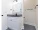 Bright bathroom with gray countertop and matte black plumbing fixtures at 723 W 113Th Ave, Tampa, FL 33612