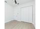 Bedroom with ceiling fan, closet and interior door at 723 W 113Th Ave, Tampa, FL 33612