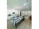 Modern kitchen with a large island, sleek countertops, and ample seating for casual dining at 723 W 113Th Ave, Tampa, FL 33612