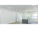 Bright, modern kitchen featuring a gray island, white cabinets, and contemporary design at 723 W 113Th Ave, Tampa, FL 33612