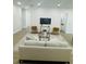 Bright living room with modern decor and neutral color palette, creating a cozy atmosphere at 723 W 113Th Ave, Tampa, FL 33612