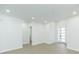 Spacious, well-lit room with modern flooring and a view of a stylish entrance at 723 W 113Th Ave, Tampa, FL 33612