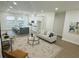 Spacious living area showcasing modern design, an open layout, and seamless integration with the kitchen at 723 W 113Th Ave, Tampa, FL 33612