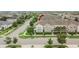 Aerial view of a townhome in a neighborhood with mature trees at 7325 Parkshore Dr, Apollo Beach, FL 33572