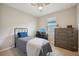 Comfortable bedroom with a twin bed and a workstation at 810 Hillshire Pl, Spring Hill, FL 34609