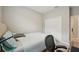 Bright bedroom with a comfortable bed and a spacious closet at 810 Hillshire Pl, Spring Hill, FL 34609