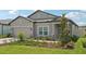 Well-maintained single-story house with a manicured front yard and an attached garage at 810 Hillshire Pl, Spring Hill, FL 34609