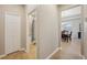 Hallway with access to the bathroom and the dining room at 810 Hillshire Pl, Spring Hill, FL 34609