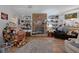 Inviting living room featuring a stone fireplace and open shelving, great for decor at 8248 Irene St, Zephyrhills, FL 33540
