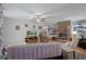 Cozy living room with a ceiling fan and a fireplace, perfect for relaxing at 8248 Irene St, Zephyrhills, FL 33540