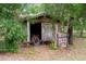 Exterior view of shed with sliding door and storage area at 8248 Irene St, Zephyrhills, FL 33540