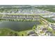 Aerial view of community near lake and playground with easy highway access at 9140 Hillcroft Dr, Riverview, FL 33578
