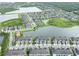 The community features townhomes and apartments with ponds and green space viewed from above at 9140 Hillcroft Dr, Riverview, FL 33578
