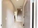 Inviting entryway features tile flooring, staircase, and neutral paint, creating a seamless transition into the home at 9140 Hillcroft Dr, Riverview, FL 33578
