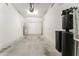 Garage with water heater and water conditioning equipment at 9140 Hillcroft Dr, Riverview, FL 33578