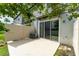 Cozy patio overlooking the lake, complete with privacy fence, perfect for relaxation and enjoying the scenic views at 9140 Hillcroft Dr, Riverview, FL 33578