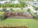 Community playground with swings, climbing dome, and safety mulch at 9140 Hillcroft Dr, Riverview, FL 33578