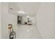 Spacious living room showcasing marble floors, neutral tones, and seamless flow at 9511 N Hyaleah Rd, Tampa, FL 33617