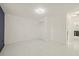 An empty room with marble floors, a closet, and white walls at 9511 N Hyaleah Rd, Tampa, FL 33617