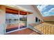 Balcony view of a tranquil lake with a roof top at 9800 Sago Point Dr, Seminole, FL 33777
