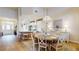 Dining room shows modern furniture and is adjacent to an updated kitchen, creating an open-concept design at 9800 Sago Point Dr, Seminole, FL 33777