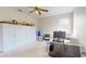 Office space featuring ample storage, a desk with computers, and natural light at 9800 Sago Point Dr, Seminole, FL 33777
