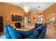 Vaulted ceiling and light-filled living room featuring modern fixtures and comfortable seating at 10228 Yellow Pine Way, Hudson, FL 34667