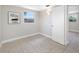 Bedroom with tile floor, baseboards, neutral paint, and window at 10599 111Th N Ave, Largo, FL 33773