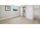 Bedroom with a closet and large window providing natural light at 10599 111Th N Ave, Largo, FL 33773