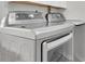 Laundry area with stainless steel front load washer and dryer with glass door at 10611 131St St, Largo, FL 33774