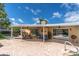 Outdoor patio area with table setting, chairs, and access to the refreshing backyard pool at 10611 131St St, Largo, FL 33774